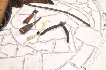 Section of stained glass window in the process of rebuilding.